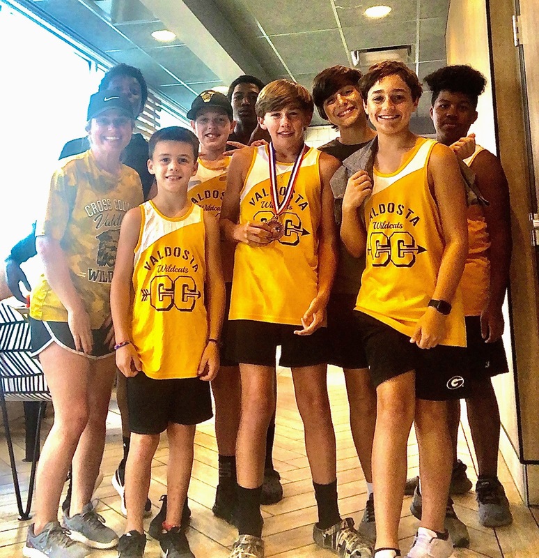 jake-reid-wins-a-medal-in-cross-country-race-valdosta-middle-school